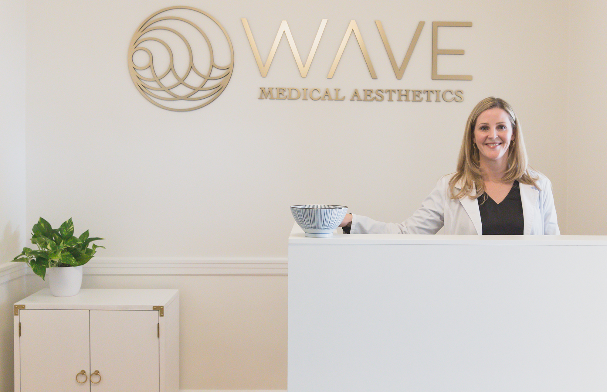 Reception Desk | Wave Medical Aesthetics in Needham, MA