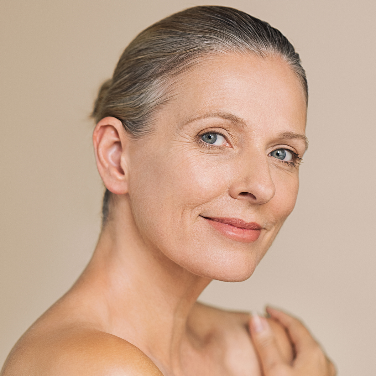 A aged lady with glowing skin smiling | Xeo Laser Genesis In Needham, MA | Wave Medical Aesthetics