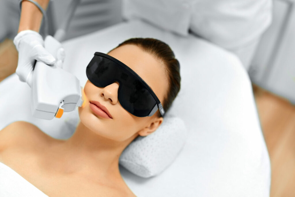 Young Woman Receiving IPL Photo Facial Facial Treatment | Wave Medical Aesthetics in Needham, MA