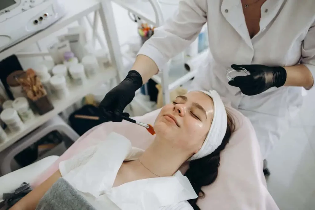 Woman receiving VI Peel treatment at a med spa in Needham, MA